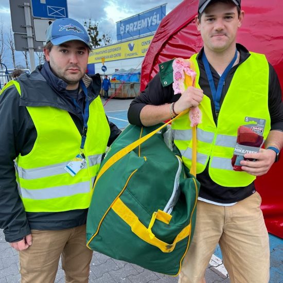 Adam Roof and Colin Hilliard in Medyka Poland at the border delivering Humanitarian Aid
