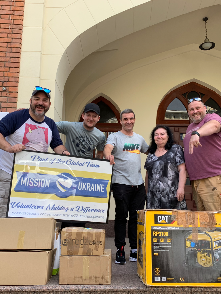 Travis Goode and Simon Massey with Action Beyond Words delivering humanitarian aid and generators in Kharkiv. Generators donated through HAFGB.