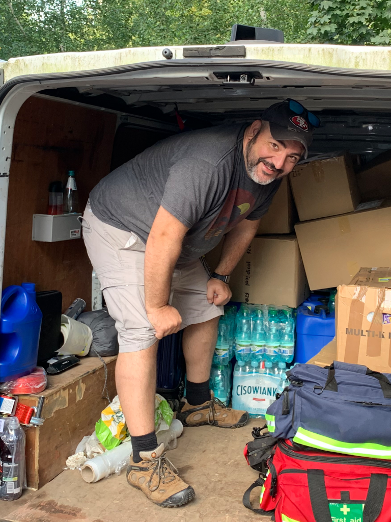 Travis Goode unloading Humanitarian aid in Kharkiv. 