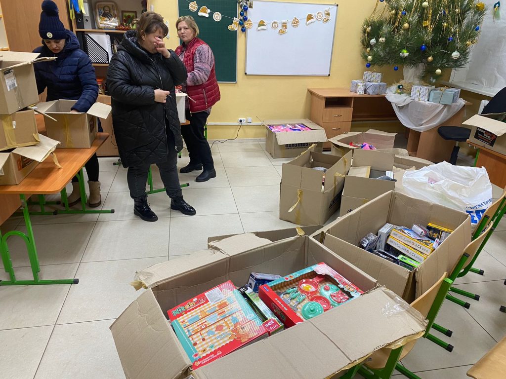 Teachers receiving goodies for children in South Eastern Ukraine.