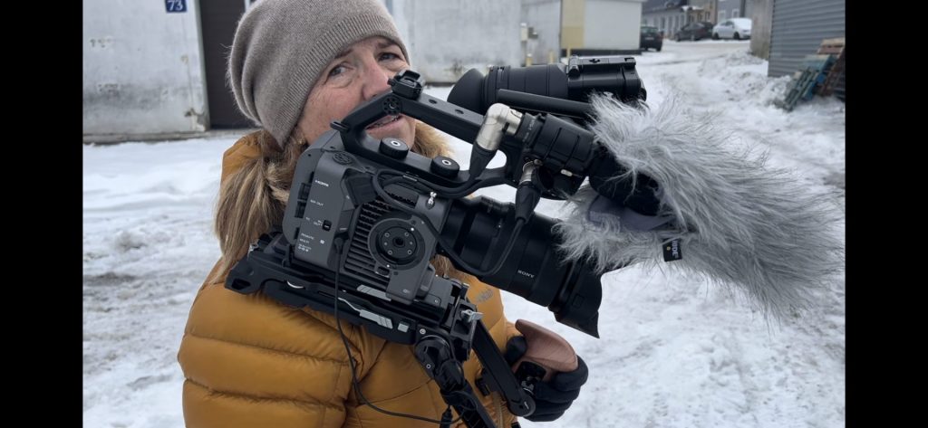 Louise Budd from Red Spot Films, recording and documenting Actions Beyond Words aid arrival from Finland's Nada Nord, facilitated through Paracrew Humanitarian Aid