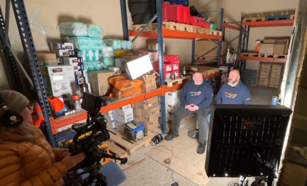 Simon Massey and Travis Goode of Actions Beyond Words [ABW] ready to be interviewed by Louise Budd of Redspot Films  in Medyka, pertaining to their Humanitarian work in Ukraine, 
