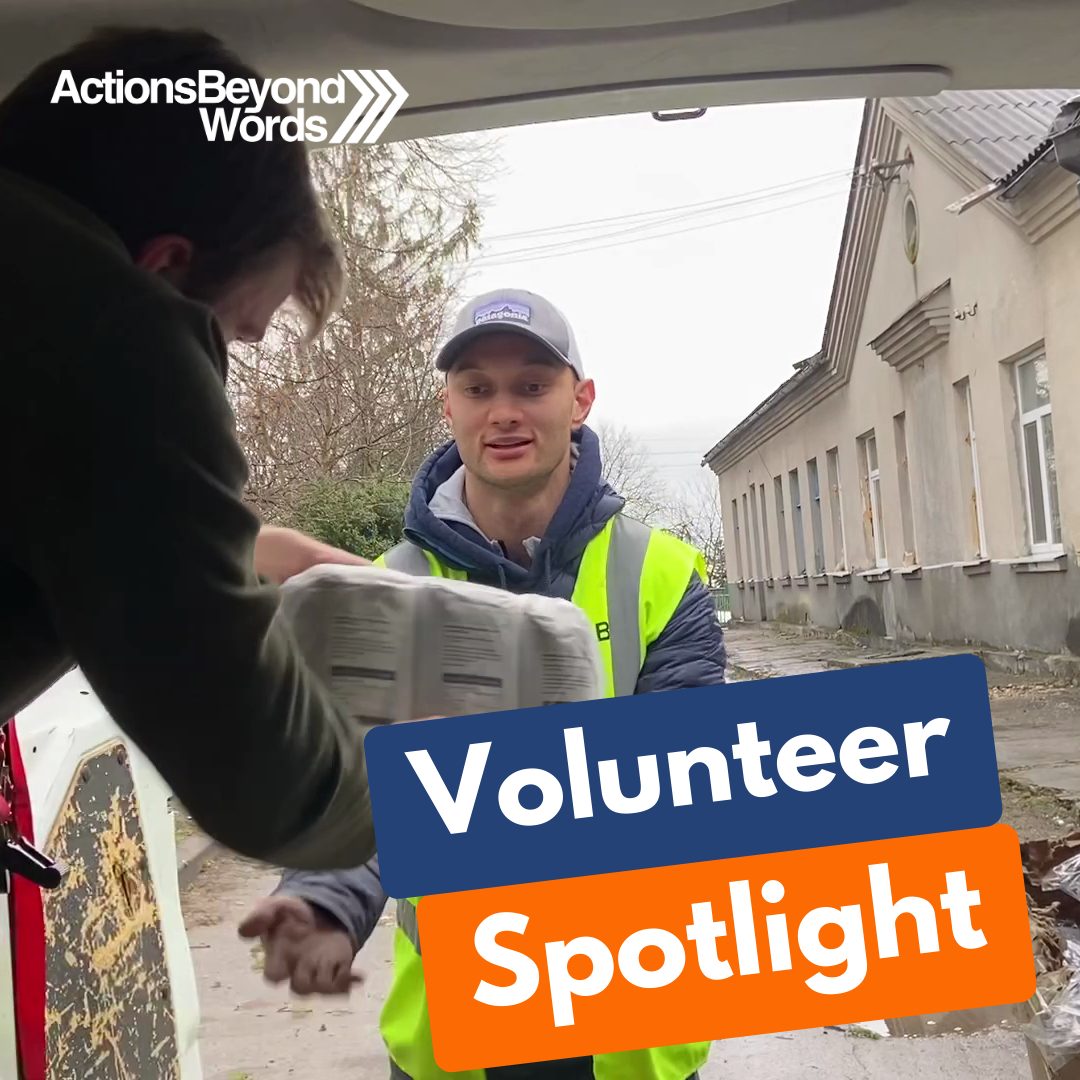 ABW volunteers Andre and Charlie unloading flour from the back of an ABW van in Ukraine as part of the unloading process at a shelter in Ukraine.